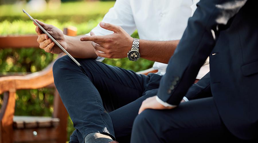 Business meeting in a park